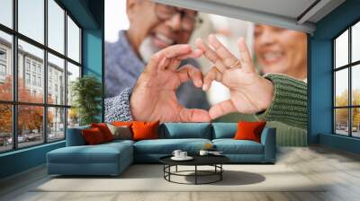 Smile, heart hands or old couple with support, love or hope in a marriage commitment at home together. Happy, valentines day blur or romantic senior man with trust or elderly woman on anniversary Wall mural