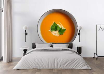 bowl of carote vegetable soup isolated Wall mural