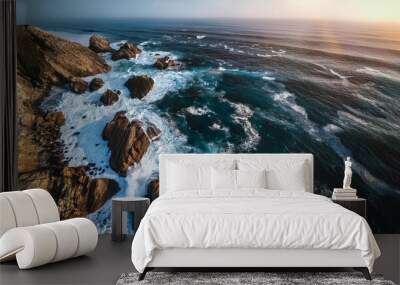 dramatic overhead shot of rugged coastline with rocks and crashing waves nature background Wall mural