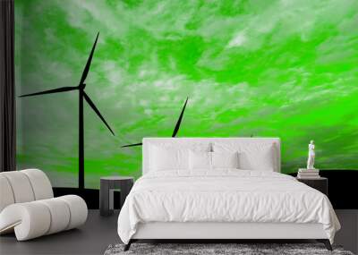 Silhouette of a windmills on a hills, against the background of a green sky with clouds Wall mural