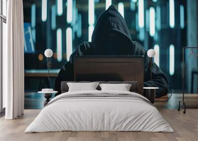 Back hoodie hacker in front of laptop Wall mural