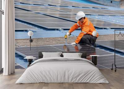 Engineer repair solar panel on the factory rooftop Wall mural