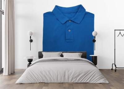 isolated folded blue polo shirt on white background Wall mural