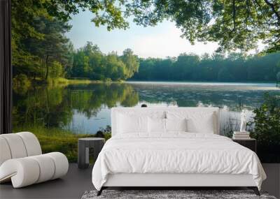 Outdoor meditation in nature, a person meditating by a tranquil lake, surrounded by trees and natural beauty Wall mural