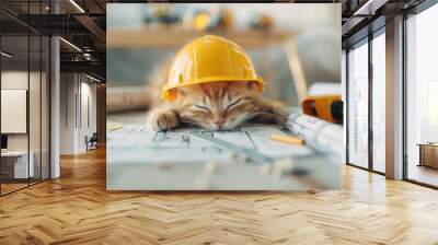 A cat wearing a yellow hard hat is sleeping on a table with construction tools by AI generated image Wall mural