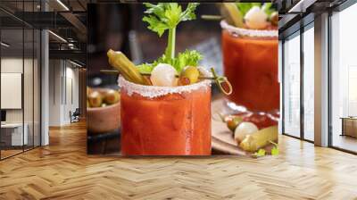 Bloody mary cocktail with garnishes on rustic wooden table Wall mural