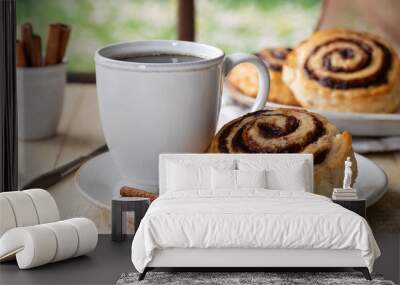 Glazed cinnamon roll and coffee Wall mural