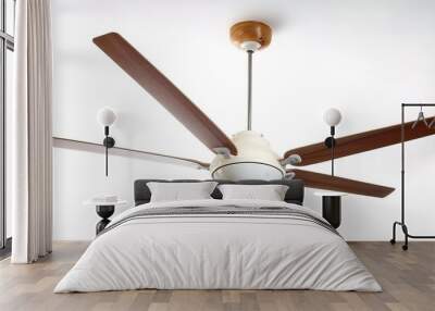 Ceiling fan mounted on the ceiling of a room or space, usually electrically powered, that uses hub mounted rotating blades to circulate air low angle view Isolated on white background Wall mural