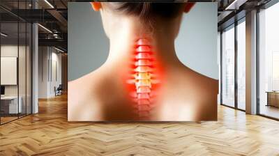 A close-up of the back of a person's neck, highlighting the spine with a red aura, indicating discomfort or pain. Wall mural