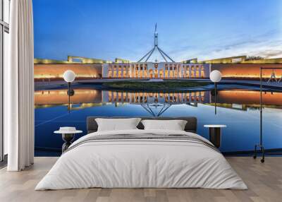 Dramatic evening sky over Parliament House, illuminated at twilight. Which was the world's most expensive building when it was completed in 1988 in Canberra, Australia Wall mural