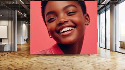 Close-up of a young Black girl model in modern fashion, showing joy and confidence, half-body Wall mural