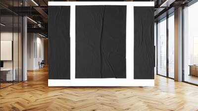 black paper wrinkled poster template , blank glued creased paper sheet mockup. black poster mockup on wall. empty paper mockup. Wall mural