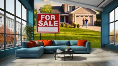 Professional real estate photography focusing on FOR SALE yard sign in clean simple frame, high resolution blurred house, people, couple, first time home buyers Wall mural