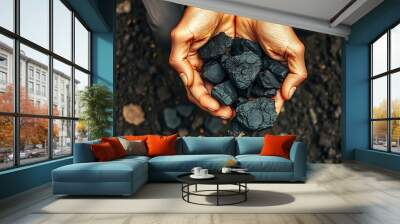 Rough black coal chunks held in a person's hands, surrounded by dirt and debris miner or minning concept created with generative ai Wall mural