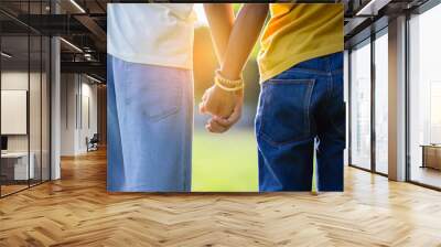 Two pairs of hand touching each other, helping hands Wall mural