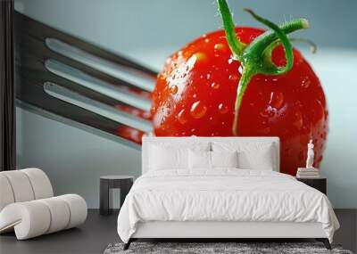 Close-up of Fork Piercing Cherry Tomato Ready to Burst with Juice, Fresh and Juicy Wall mural