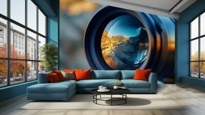 A close-up of a camera lens with a reflection of a desert landscape. Wall mural