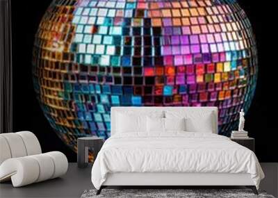 A colorful disco ball reflecting light against a dark background. Wall mural