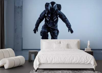 A person in futuristic attire jumps in a sterile environment. Wall mural