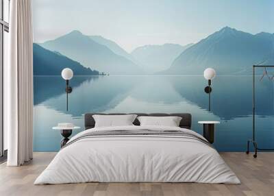 Tranquil lake reflecting a mountain range on a calm day. Wall mural