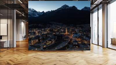 Aerial drone view of Andalo town at night with mountains background in winter. Snow covered Italian Dolomites at winter.Ski resort Paganella Andalo, Trentino-Alto Adige, ItalyItalian Dolomites Wall mural