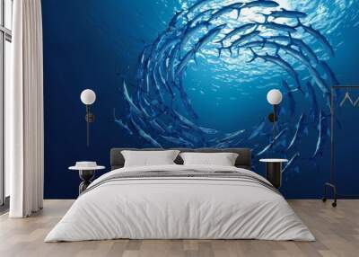 A group of fish swimming in a circle in the ocean Wall mural