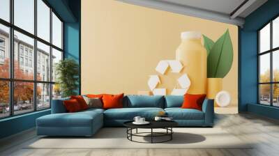 A vibrant display featuring a yellow juice bottle, recycled elements, and green leaves against a soft yellow background, emphasizing eco-friendliness. Wall mural