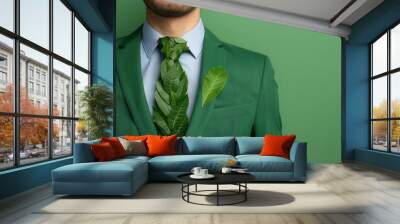 Businessman in formal wear with a tie fashioned from leaves, emphasizing eco-conscious corporate culture Wall mural