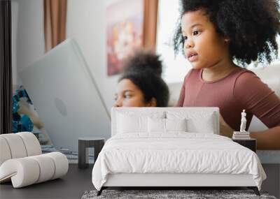 two african american girls learned robot arms with a program computer. innovative technology mechani Wall mural