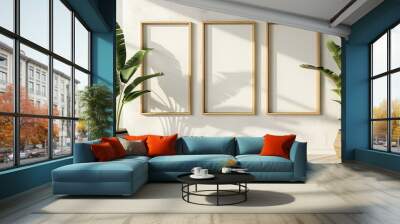 three wooden frame on white wall, frame mockup, 3d render  Wall mural