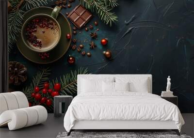 A cup of coffee surrounded by Christmas decorations, pine branches, and red beads on the table Wall mural