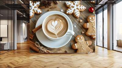 A cup of coffee with latte art in the shape of a heart on a wooden table Wall mural