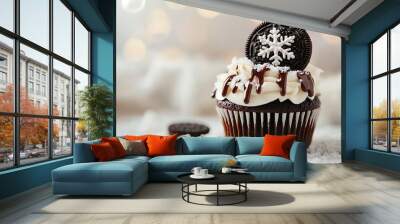 Oreo cupcake with dripping chocolate and an Oreo cookie and a large snowflake place on top, on a light soft lighting bokeh background Wall mural