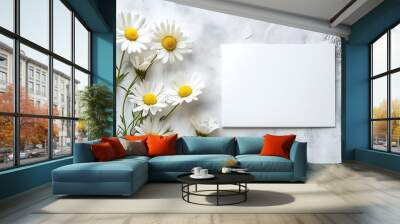 White blank card and daisies on a light gray background Wall mural