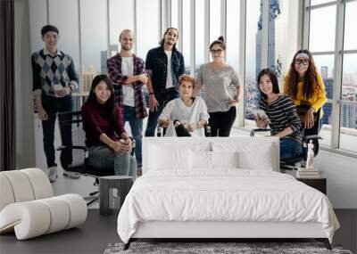 Portrait of happy diverse creative business team group looking at camera and smiling. Multiethnic success designer start up team working together on creative project. Group shot partnership concept. Wall mural