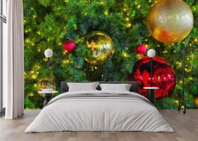 Many gold and red ornament shiny ball on Green Christmas tree. Can use for background and add text.  Wall mural