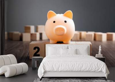 Piggy Bank on top of wooden block. Budget Plan 2024. Wall mural