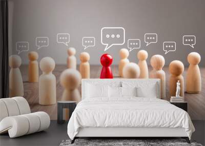 Wooden figurine with speech bubble. Mingle, discussion, chatting concept Wall mural