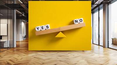 yes vs no. choice concept. balance scales on yellow background. Wall mural