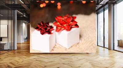 two white gift boxes with red bows Wall mural