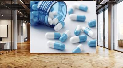 Blue and white capsules scattered from an open bottle on a white surface, Healthcare medication, Modern pharmaceutical concept with a focus on precision Wall mural