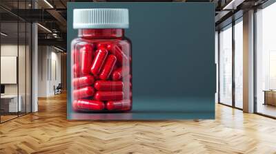 Close-up of a bottle filled with red capsules, emphasizing pharmaceutical products and healthcare solutions, medication bottle, health and wellness Wall mural