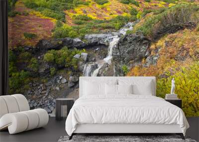 beautiful two-stage waterfall. Stunning autumn landscape. Wall mural