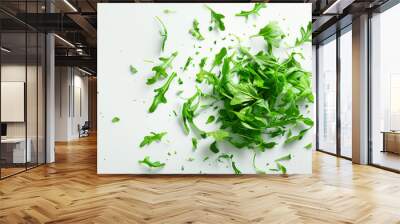 The ingredient for the salad. An organic natural product. The green arugula leaves are stacked in a circle on a white table. The concept of freshness and summer Wall mural