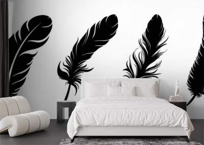 Feather icons. Set of black feather icons isolated on white background. Feather silhouettes. Vector illustration Wall mural