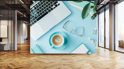  Serene pale pink、 pale blue and white flat lay featuring a laptop, coffee, and notebooks, embodying a chic and productive lifestyle for your blog. Wall mural