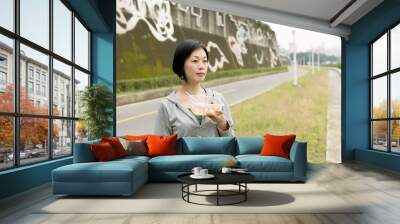 woman eat salad Wall mural