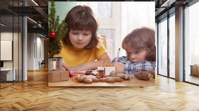 two Boys write a letter to Santa Claus. Near christmas tree. Merry Christmas and Happy Holidays. Wall mural