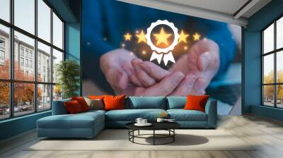 customer service satisfaction survey concept, Businessman hand holding virtual five stars and quality certificate mark Wall mural