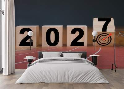 Multi exposure of running track and wooden cube 2027 target board new year in concept of action business plan targets the new year 2027 growth Wall mural